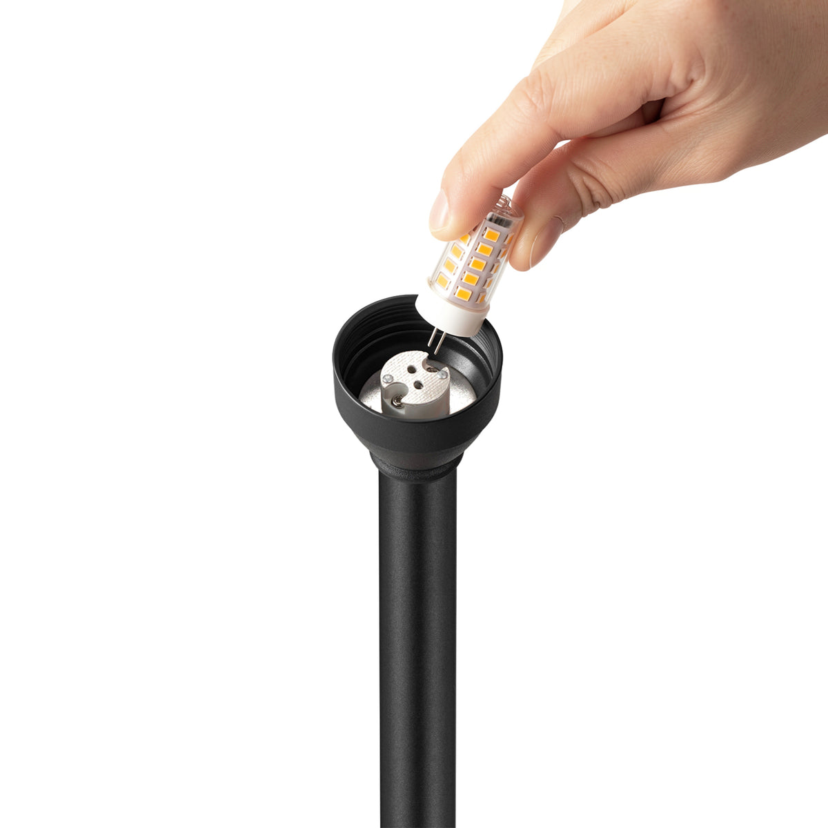 HIBOITEC China Hat Path Light in sand black — G4 bulb being removed from the socket